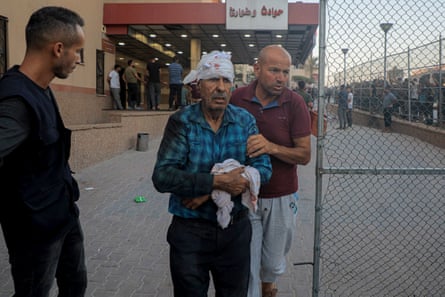 A man injured in an Israeli bombing is seen at a hospital in the southern Gaza Strip city of Khan Younis.