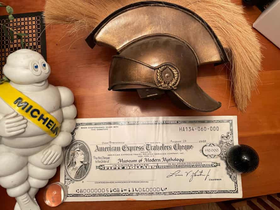 Michelin man with centurion helmet and American Express check