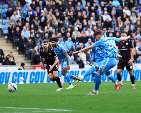 Torp of Coventry City scores his sides penalty.