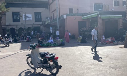 People gather on the streets in Marrakech on Saturday