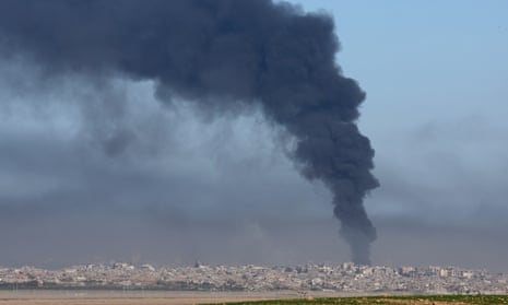 A picture taken from a position in southern Israel, along the border with the Gaza Strip, shows smoke billowing over the Palestinian territory.