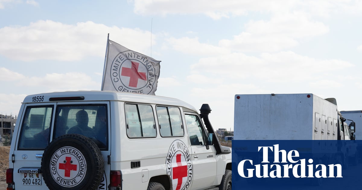 Body handed over by Hamas is not hostage, says Israel, as Palestinian dead ‘arrive back in cuffs’