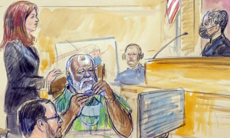 The artist sketch depicts Assistant U.S. Attorney Erik Kenerson, front left, watching as Whitney Minter, a public defender from the eastern division of Virginia, stands to represent Abu Agila Mohammad Mas'ud Kheir Al-Marimi, accused of making the bomb that brought down Pan Am Flight 103 over Lockerbie, Scotland, in 1988, in federal court in Washington, Monday, Dec. 12, 2022, as Magistrate Judge Robin Meriweather listens.
