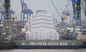 Russia-Ukraine war latest: Moscow says warship still afloat despite explosion; west says Ukraine claim of strike ‘credible’ – live | World news 8 The luxury yacht Dilbar lies completely covered in the Blohm+Voss dock Elbe 17 in Hamburg, Germany.