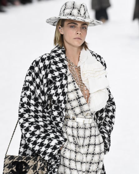 Model and actor Cara Delevingne in Chanel’s signature tweed and pearls.