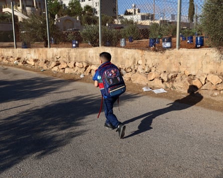 Palestinians return to school in West Bank as new academic year beginsepa13217001 A Palestinian student walks to school during the first day of the new academic year in the village of Al-Mughayyir, near Ramallah, West Bank, 06 September 2026. Since the beginning of 2026, several Palestinian teenagers have been killed in attacks involving Israeli settlers, including in shooting incidents near the village school, according to a report by the UN Human Rights Office in the Occupied Palestinian Territory (OHCHR oPt). EPA/ALAA BADARNEH