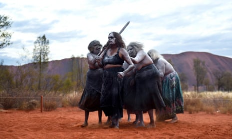 Aboriginal women performing a traditional dance at a cultural event near Uluru in central Australia: should Facebook be deciding whose stories are ‘offensive’? 