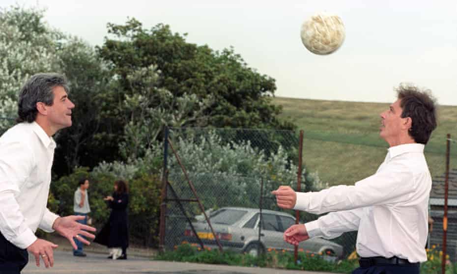 Kevin Keegan and Tony Blair play head tennis during a break at the 1995 Labour party conference