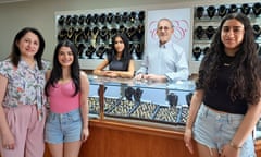 Bashar Harbi Darwish and her family at their jewelry store in Warren, Michigan.