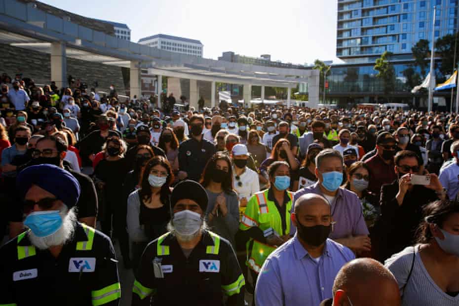 Vigil for Shooting Victims in San Jose People attend a vigil for shooting victims at a rail yard operated by the Santa Clara Valley Transportation Authority in San Jose, California, United States on May 27 2021. REUTERS / Brittany Hosea-Small