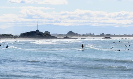A few surfers take to the water on Thursday.