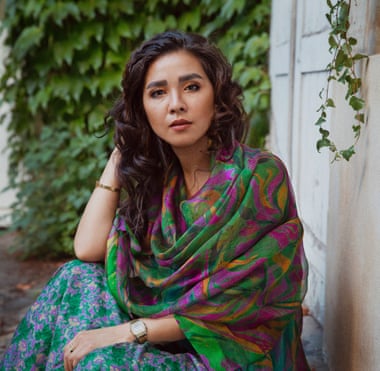 A portrait of the photographer Fatimah Hossaini by Maryam Firuzi, 2022