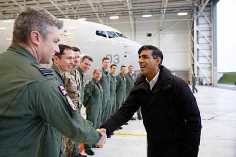 Rishi Sunak shakes hands with members of the RAF