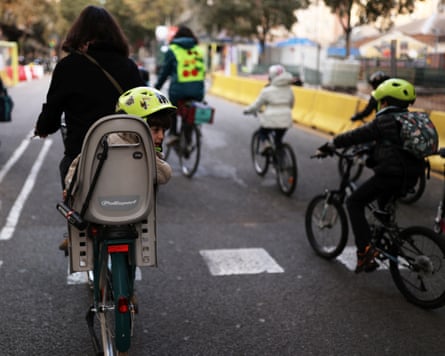 A group of children cycling on the road