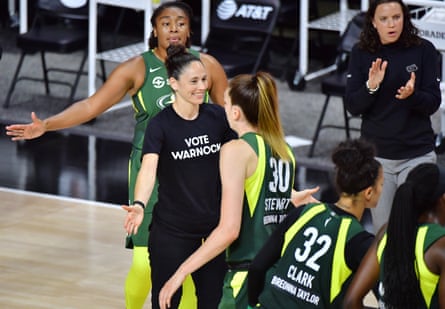 Seattle Storm point guard Sue Bird was credited with the idea of having WNBA players wear ‘Vote Warnock’ T-shirts to games in August.