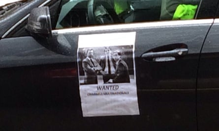 A wanted poster depicting Mark MacGann and Uber executives