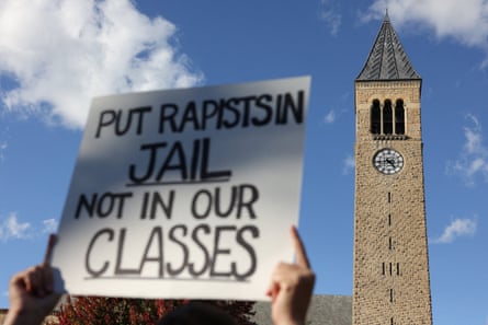 People attend a Justice for Survivors rally at Cornell University in Ithaca, New York.