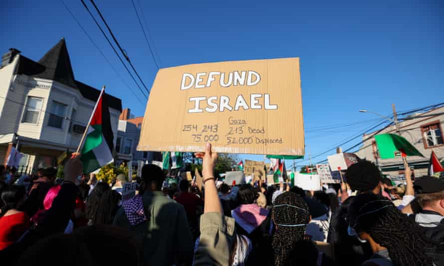 Hundreds holding banners and Palestinian flags gather in the Bronx to protest against Israeli aggression against Palestinians, in New York City last month.