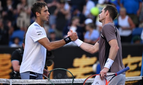 Thomas Martin Etcheverry shakes hands with Andy Murray after winning the first round on the second day of the 2024 Australian Open.