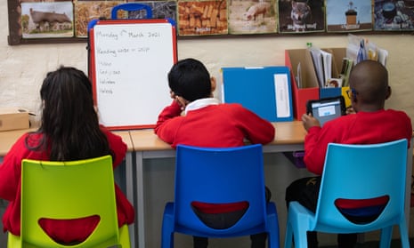 Children sitting at school desks