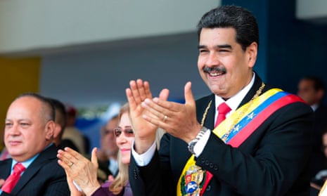 Nicolás Maduro accompanied by his wife, Cilia Flores, and Diosdado Cabello, president of the national constituent assembly, in Caracas, Venezuela, on 5 July. 