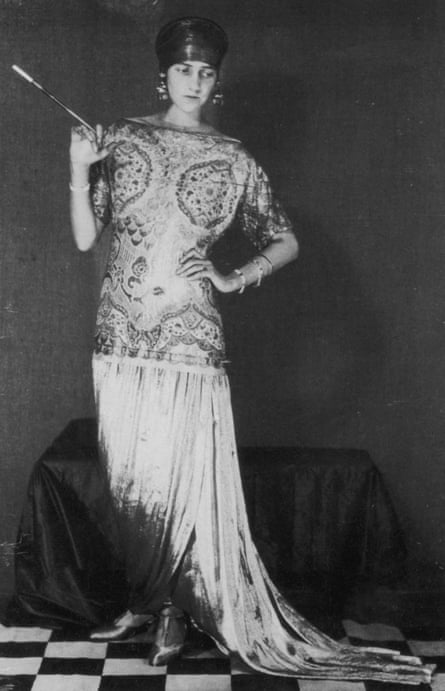 Peggy Guggenheim (1898-1979). American art patron and collector. Wearing a gown designed by Paul Poiret. Photographed by Man Ray, 1925.