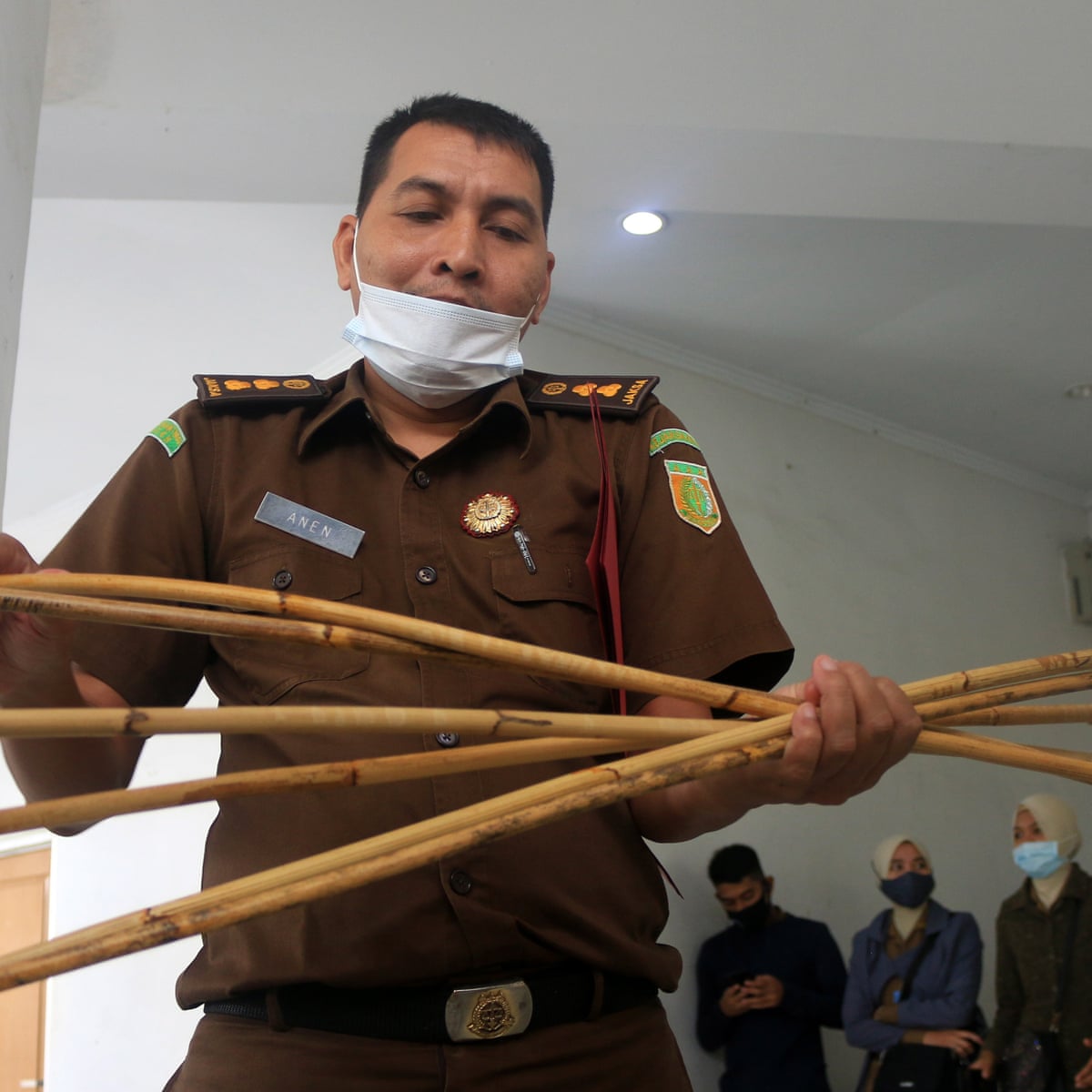 Men caned 77 times in Indonesia after 'being caught having sex' | Indonesia | The Guardian Men caned 77 times in Indonesia after 'being caught having sex' | Indonesia | The Guardian