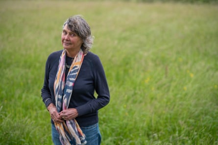 Helen Lawy standing in front of long grass.