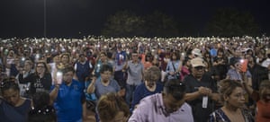 Thousands packed a baseball field at Ponder Park in El Paso, Texas to honour the victims