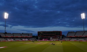 Groundstaff prepare the pitch for England’s innings.