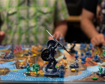 Two players watch on during a game of Dungeons and Dragons