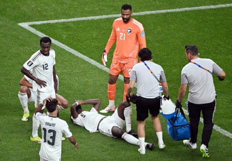 Hassan Altambakti receives medical attention after sustaining an injury