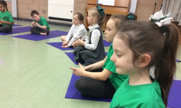 A mindfulness class at English Martyrs primary school on Merseyside.