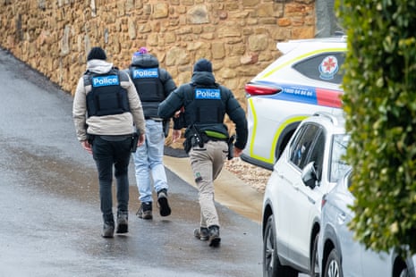 Police officers at the Feathertop Winery operations centre, just west of Porepunkah.