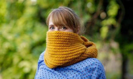 Woman with scarf wrapped around face