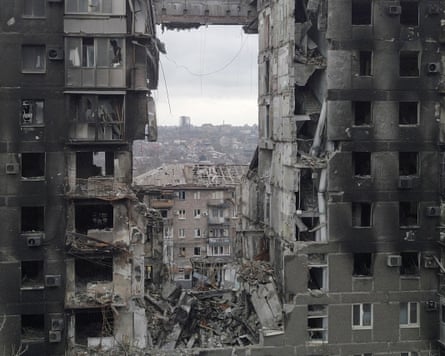 A damaged and blackened tower block