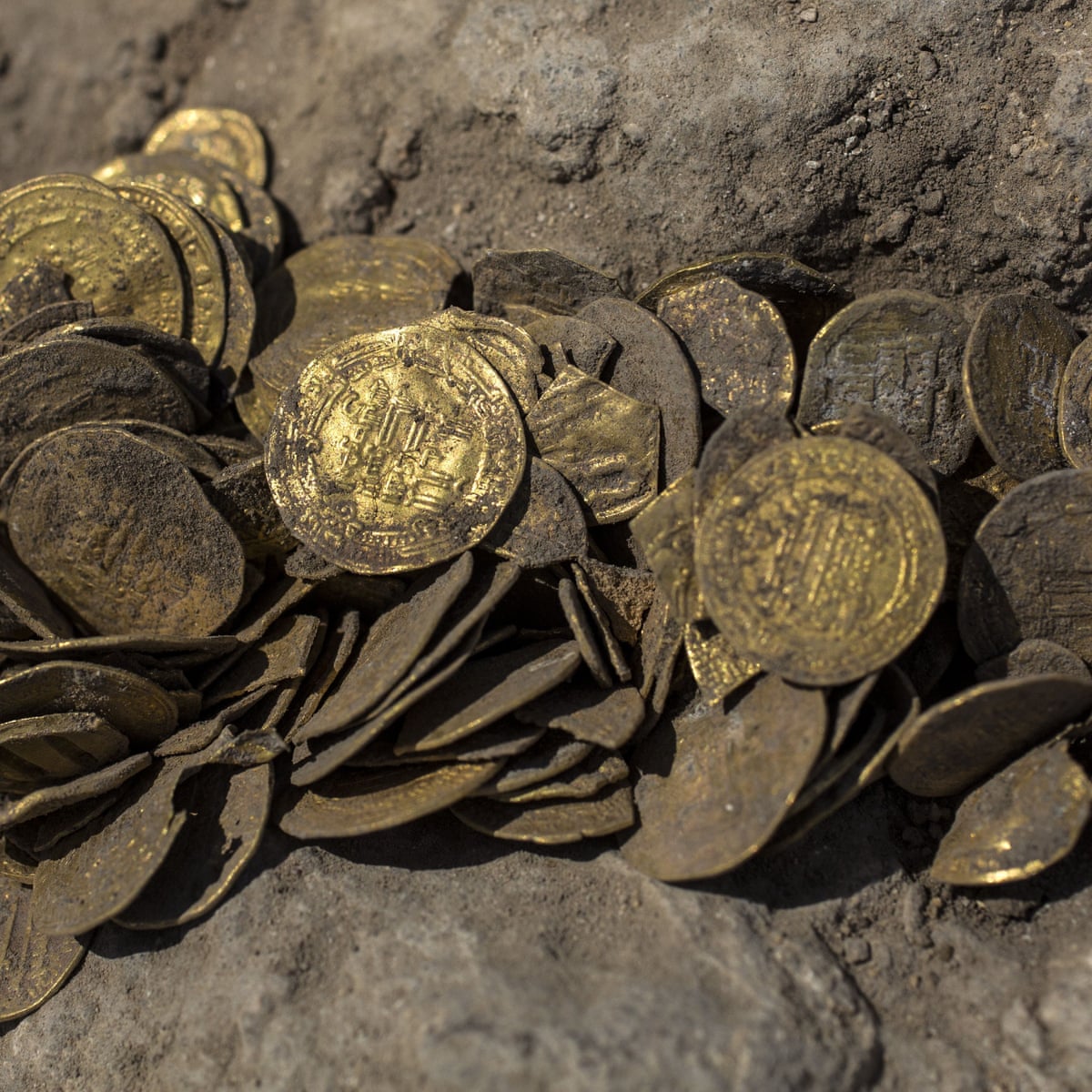 1,100-year-old gold coins found at dig site in Israel | Israel | The  Guardian