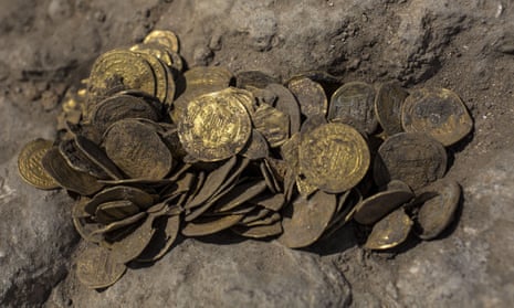 Some of the coins found at an archeological site in central Israel