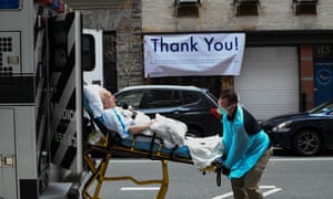 A man arrives at the emergency room of Lenox Hill Hospital in New York on Friday, when the city saw its largest single-day death toll from the coronavirus epidemic.