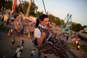 Shortlist, spotlight award From the series, In The World But Not Of It. Doria Waldner from Green Acres Colony rides the Ultimate Swings ride on the midway at the Manitoba Summer Fair in Brandon during an outing with friends. The Hutterites, pacifist Anabaptists whose roots trace back to the 16th-century reformation, live communally on colonies throughout western Canada and the north-western US
