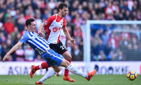 Lewis Dunk gets the tackle in on Manolo Gabbiadini.