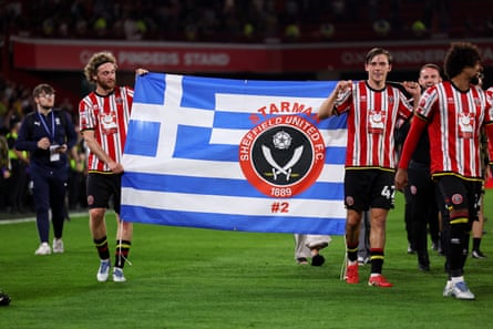Sheffield United carry a Greece flag around in honour of their late former player, George Baldock.