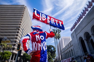 Los Angeles, CaliforniaA demonstrator holds a sign and waits outside City Hall