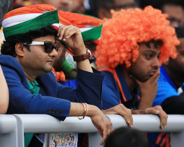 India fans look dejected at Old Trafford.