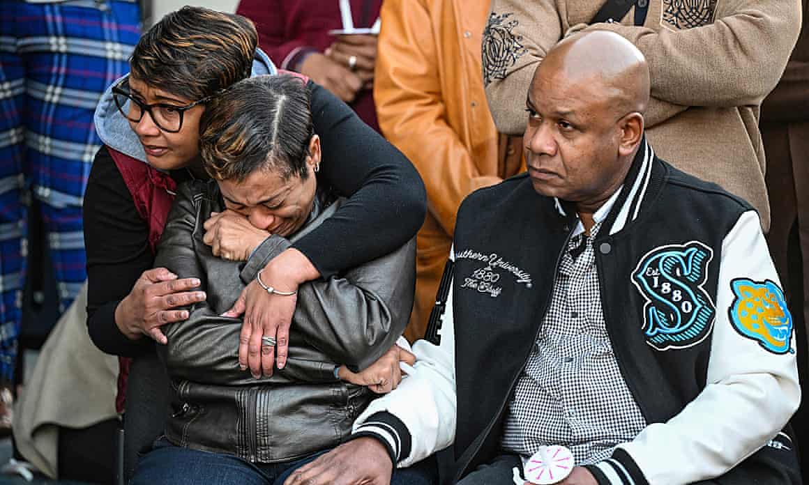 People mourning during a vigil