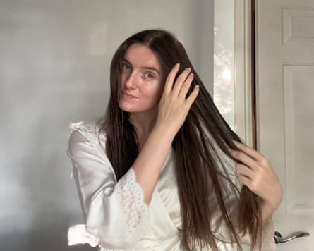 Sarah Matthews applying a hair mask