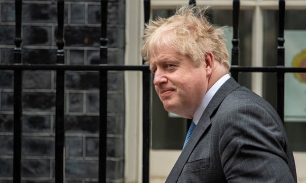 Boris Johnson leaves Downing Street to attend PMQs.