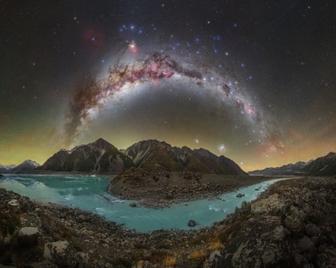 mountains surrounded by water at night in New Zealand’s South Island