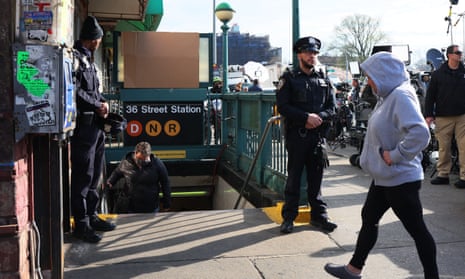 NYPD officers stand guard at the 36 Street subway station on 13 April 2022 in the Sunset Park neighborhood of Brooklyn in New York City. 