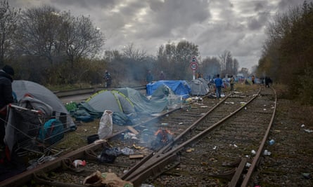 The Dunkirk ‘Jungle’ - tents and campfires on a railway line